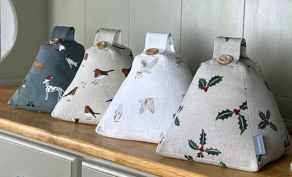 Christmas door stop. Handmade in Sophie Allport Christmas fabrics. Robin Mistletoe, Christmas Stags Reindeer fabric.