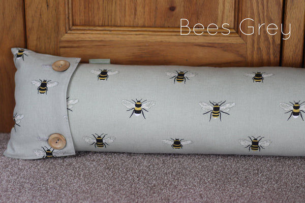 Sophie Allport draught excluder. Handmade by Harris and Home in animal Dog Stag Chicken Sheep Flamingo Christmas Fabric