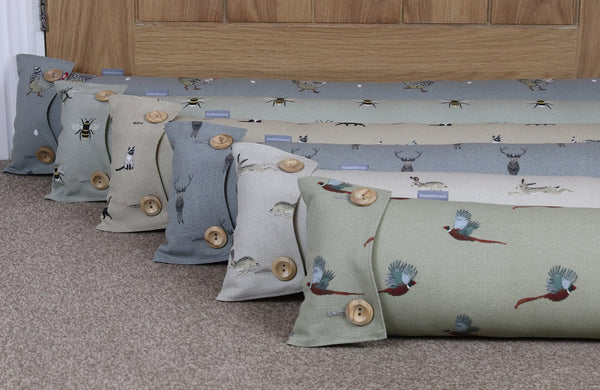 Sophie Allport draught excluder. Handmade by Harris and Home in animal Dog Stag Chicken Sheep Flamingo Christmas Fabric